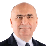Ilie Bolojan, numit din nou premier după ce românii au admis că le-a crescut nivelul de trai, chiar dacă au mai puțini bani